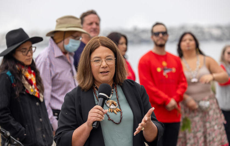 Violet Sage Walker, chairwoman of the Northern Chumash tribal council, speaks in Sept. 2023 at a rally at the base of Morro Rock to support the boundaries of the Chumash Sanctuary. (Photo: David McNew, Greenpeace)