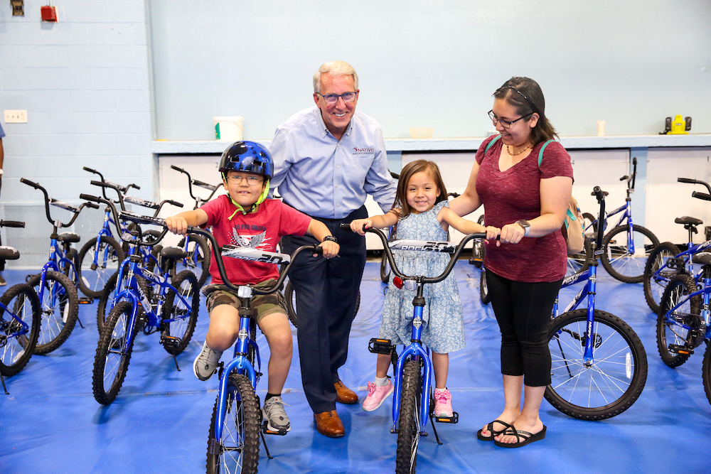 Native American Bank CEO Thomas Ogaard at a June 2023 event where the bank donated bikes to the Denver Indian Center for distribution to local children. The bank measures success through community impact projects that benefit Native families. (Photo: Courtesy) 