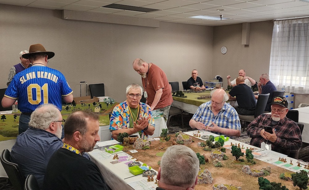 Pacific Sky Games distributed tabletop wargames worldwide through conventions like this before pivoting to print-on-demand publishing. Now the company gives independent designers control of their rules and 60% of profits. (Photo: Pacific Sky Games)