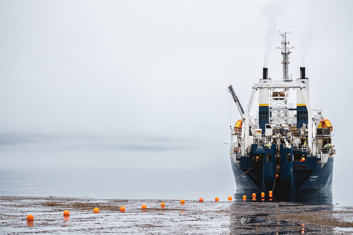 A vessel lays deep-sea fiber cable to expand internet access in rural communities on Kodiak Island in Alaska. (Courtesy photo)